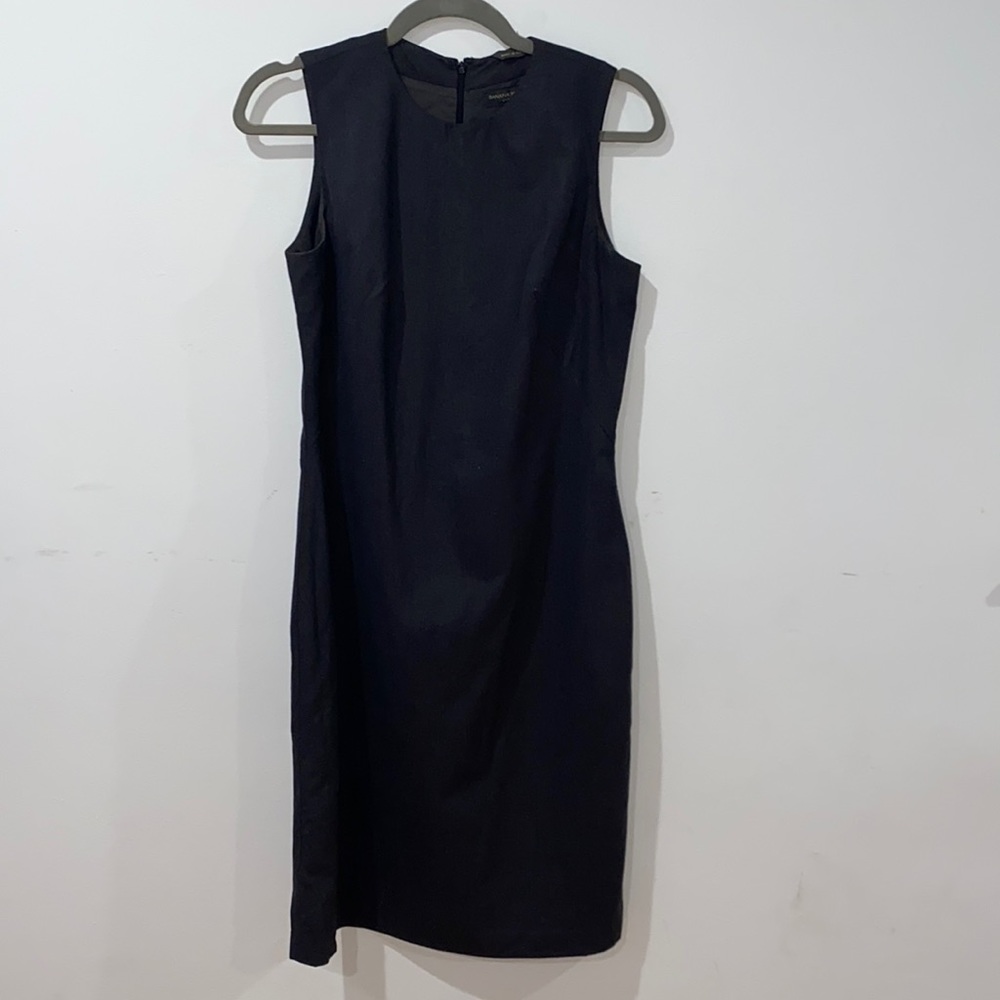Armless black midi dress.